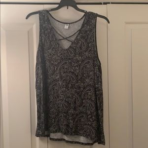 Black and white tank top with criss cross neck